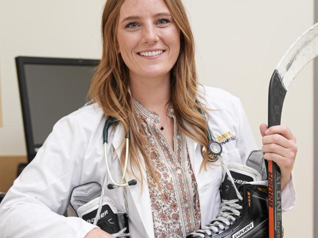 Alison Pankowski with hockey gear