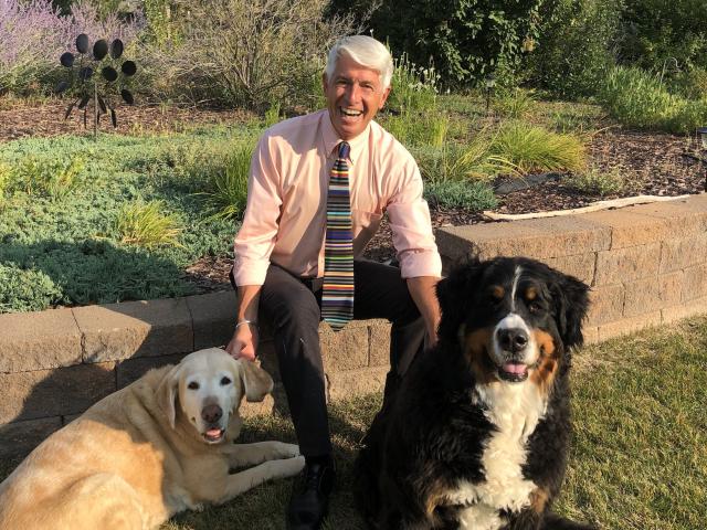 Dean Mark Stetter with two dogs