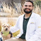 Victor Gonzalez and his canine companion Louie.