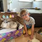 Young philanthropist with cat